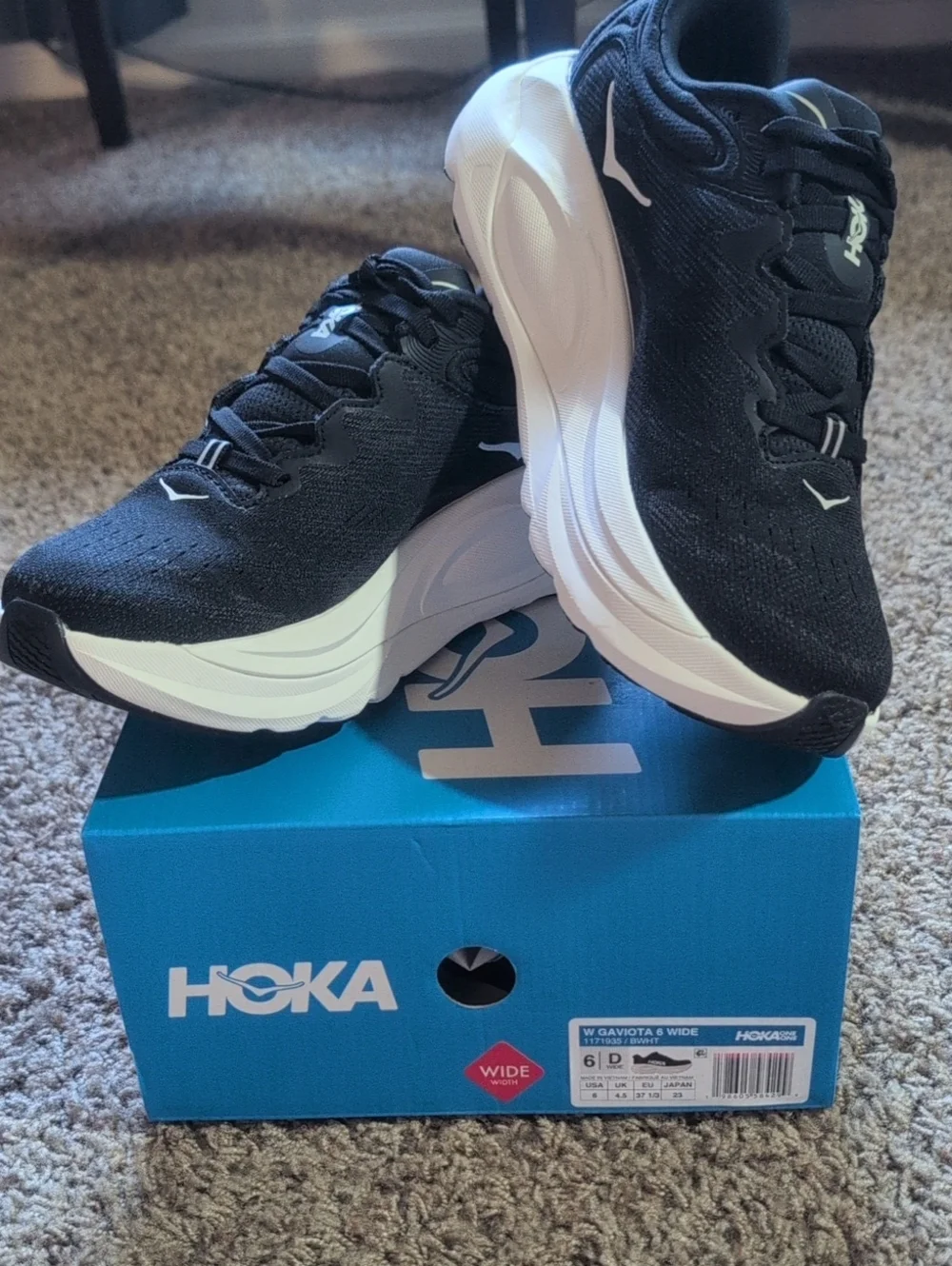 Hoka Women's Black with White Sole Athletic Running Shoes Size 6D (Wide)